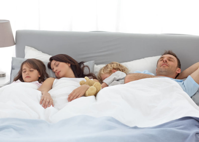 family sleeping together